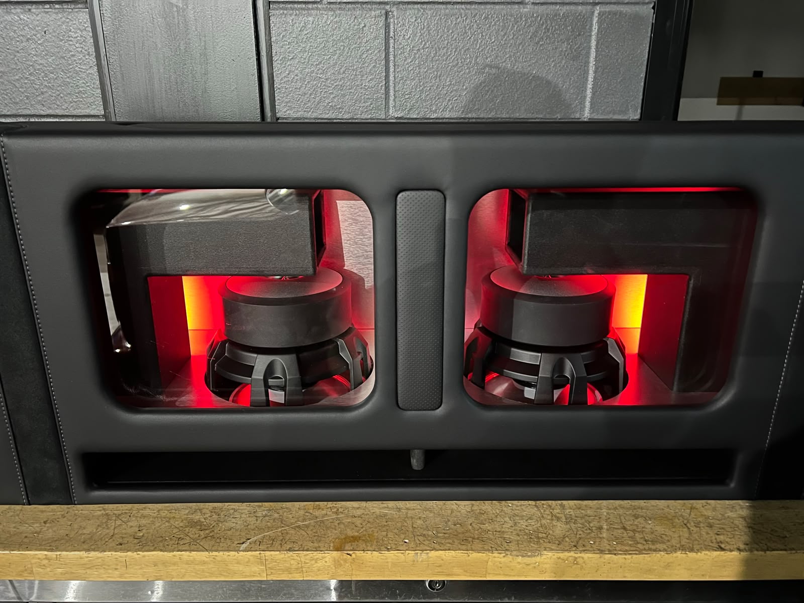 Custom gloss-finished twin subwoofer enclosure with integrated lighting