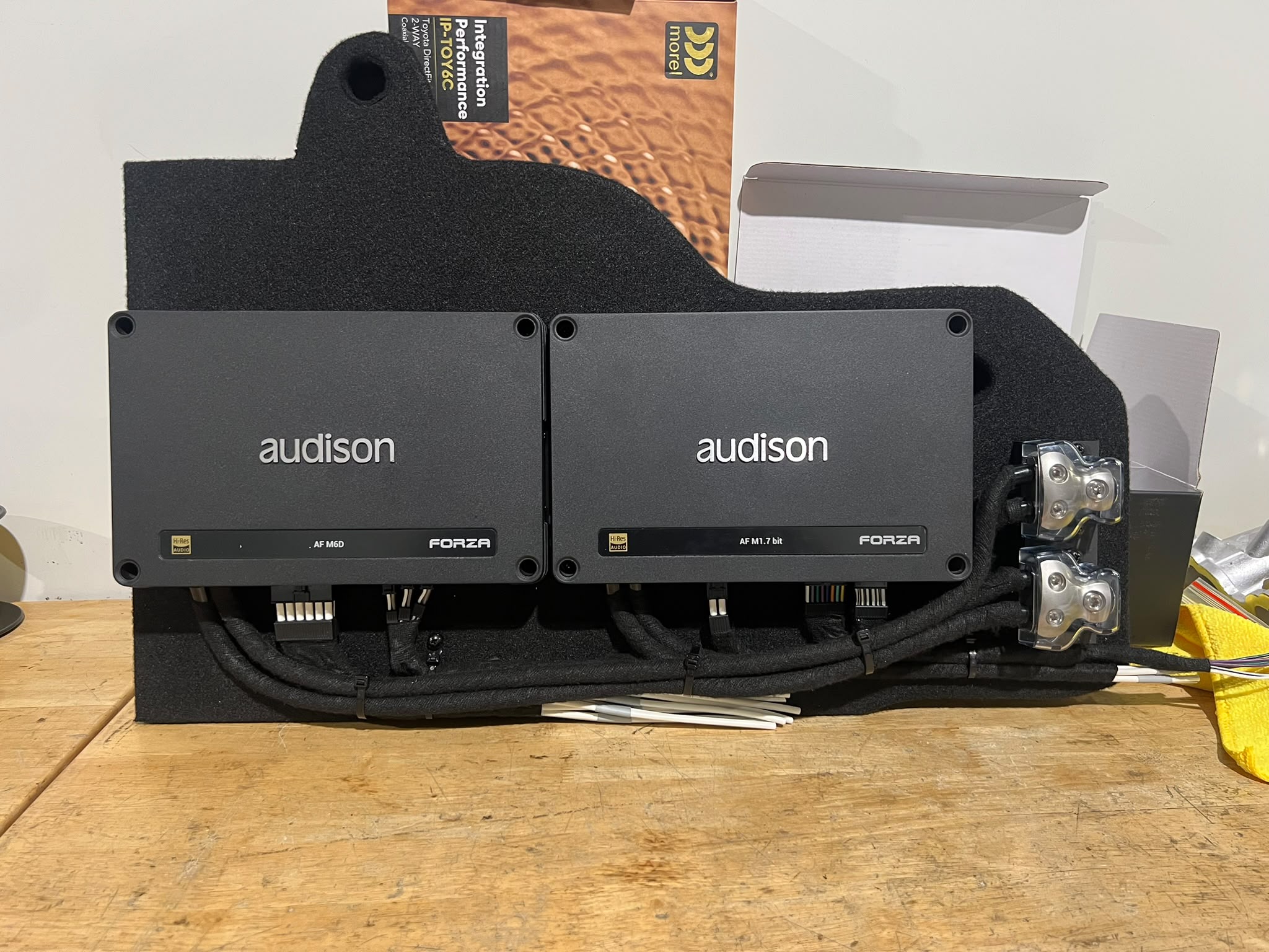 Twin Audison amplifiers mounted on a custom rack